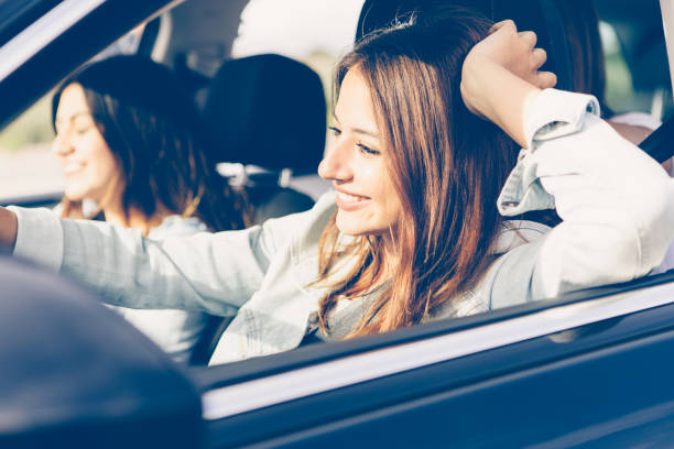istock Happy girl driving a car 846657520