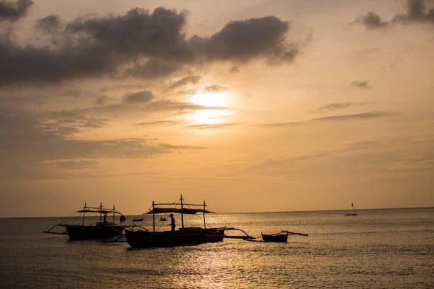 istock boast on the water during the sunset 846668172