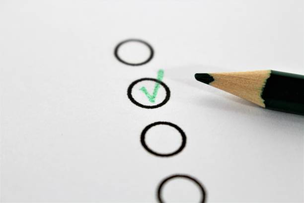 istock An concept Image of a green pencil and a questionnaire 846675360