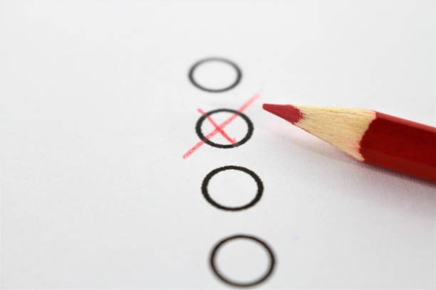 istock An concept Image of a red pencil and a questionnaire 846675372