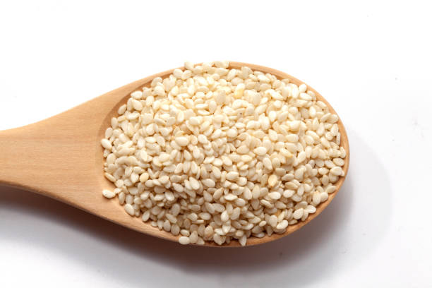 istock white Sesame on wood spoon 846678642