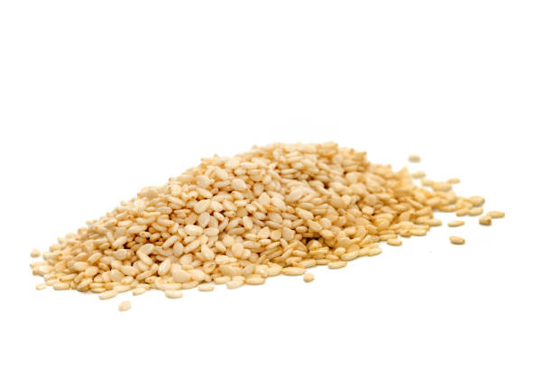 istock pile of white Sesame on white background 846681868