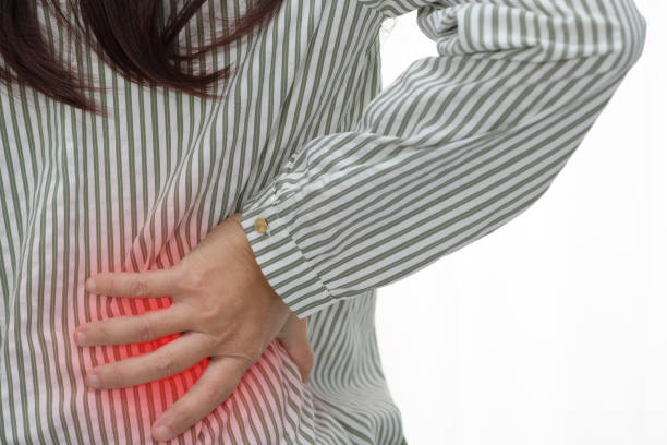 istock Woman's hand catches the waist 846682176