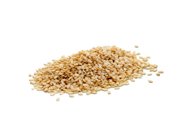 istock pile of white Sesame on white background 846682472