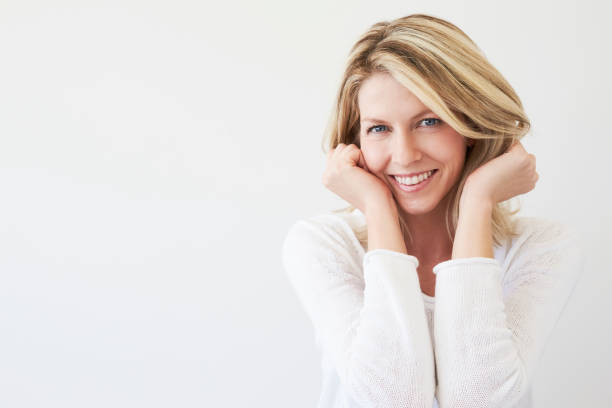 istock Blue eyed blond in white 846685686