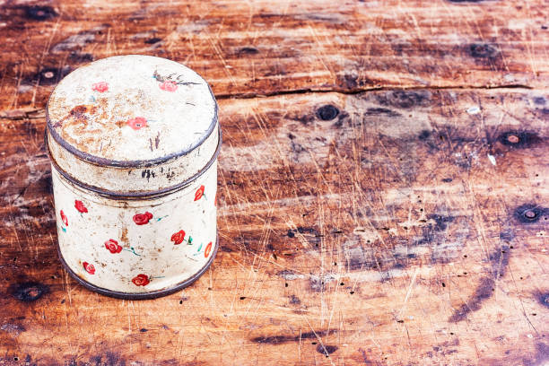 Rusty metal box on vintage wooden desk
