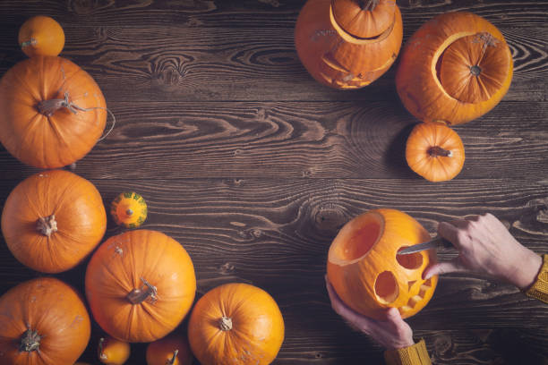 istock Ripe yellow pumpkins over wooden background 846693698