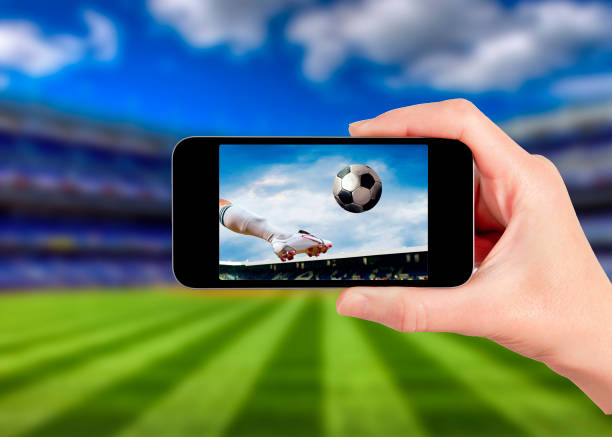istock football game on mobile phone 846696638