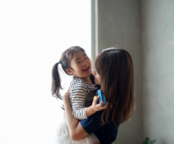 istock Mother and daughter playing together 846697288