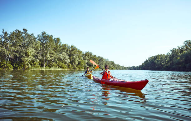 istock A canoe trip along the river along the forest in summer. 846708290