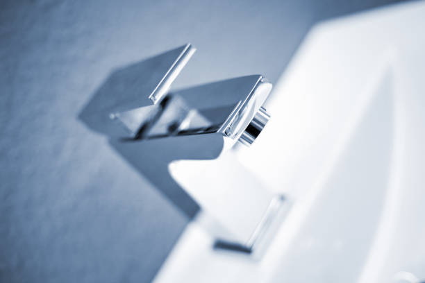 Modern water tap in bathroom