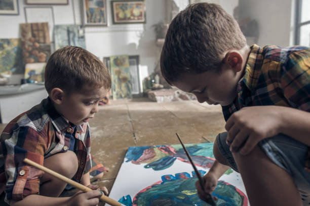 istock Young boys showing creative aspirations in an atelier 846711202