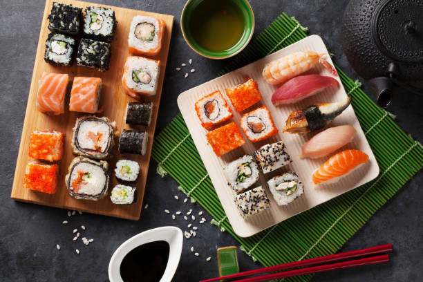 istock Set of sushi and maki roll and green tea 846713936