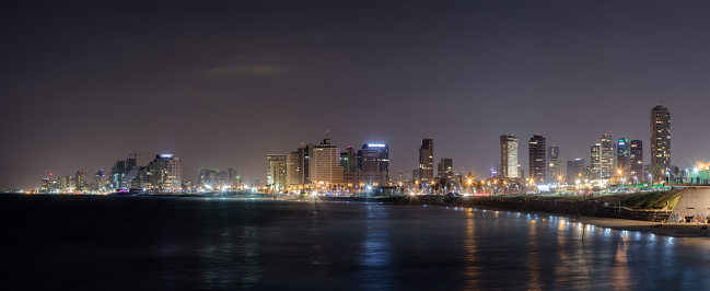 Tel Aviv-Yafo, Israel, September 08, 2017 : Panoramic view of Tel Aviv, city and bay at night. View from promenade of Old City Yafo, Israel