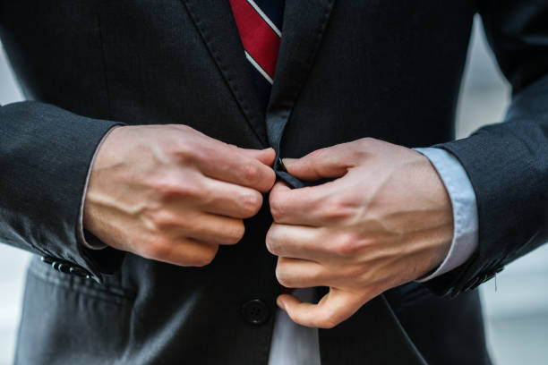 istock Businessman closing his suit 846715288