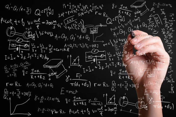 scientific formulas and calculations in physics and mathematics - physics classroom teaching professor imagens e fotografias de stock