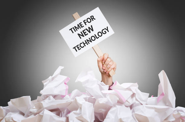 tiempo para la nueva tecnología - document paper paperwork buried fotografías e imágenes de stock