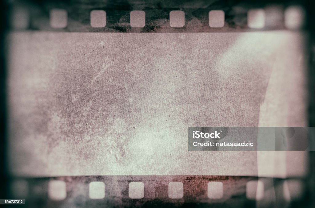 Film strip texture background Blank grained and scratched film strip texture background Movie Stock Photo