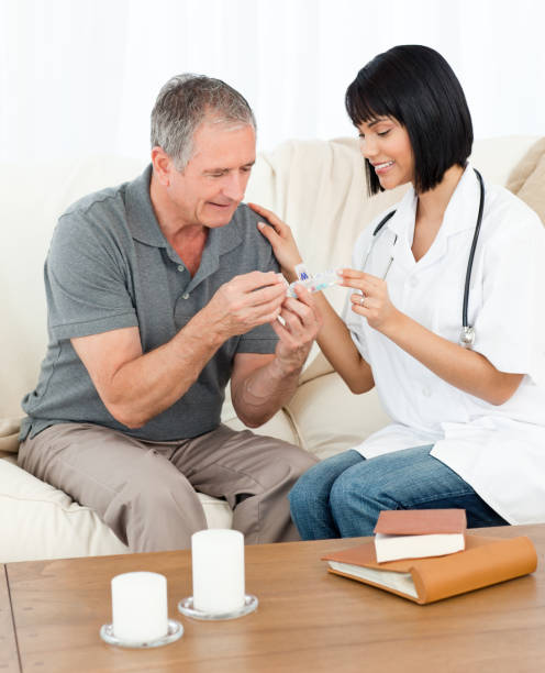 istock Nurse showing pills to her patient 846737986