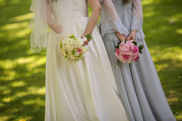 istock Bride with flowers and maids 846738684