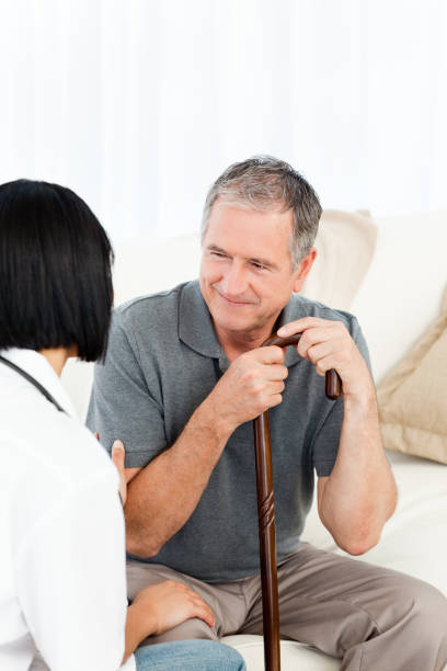 istock Retired man with his nurse 846738938