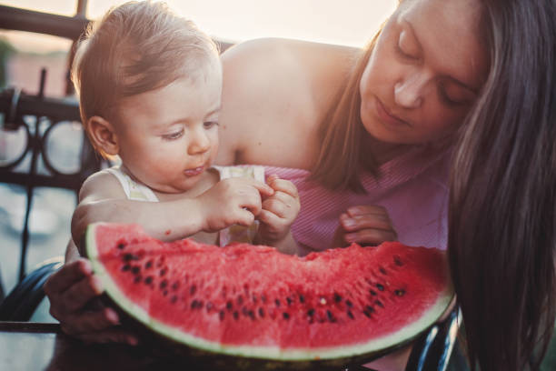 istock Cute Boy Eating Fresh Watermelon 846743112
