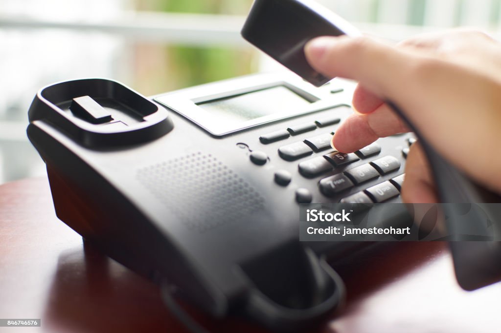 Telephone dialing ,contact and customer service concept . Selected focus . Telephone Stock Photo