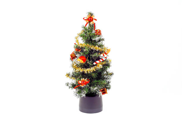 istock Decorated Christmas tree with patchwork ornament, artificial red star, hearts, hat and small presents for new year isolated on white background 846749668