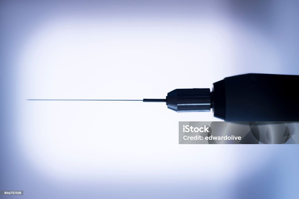 Electroacupunture dry needling needle connecting machine to needles used by acupunturist on patient for acupunture guided by EPI Intratissue Percutaneous Electrolisis. Acupuncture Stock Photo