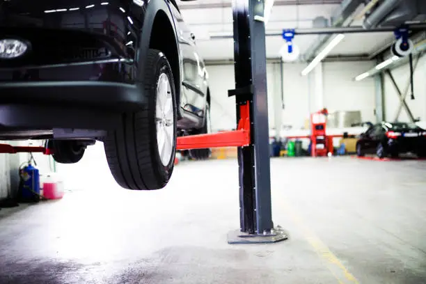 Photo of Car on lift at car service