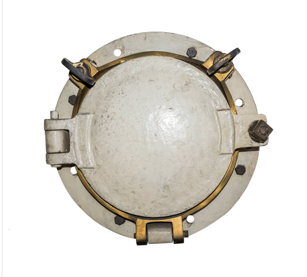 istock Round golden boat porthole window isolated on white 846751912