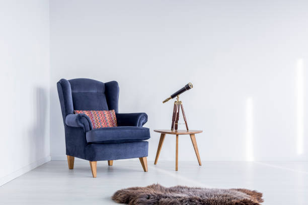istock Garnet armchair with colorful pillow 846752352