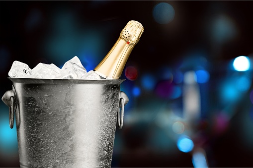 Champagne bottle in bucket isolated on  background