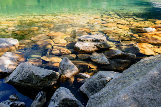 istock Morning time on beach with stone foreground 846767640