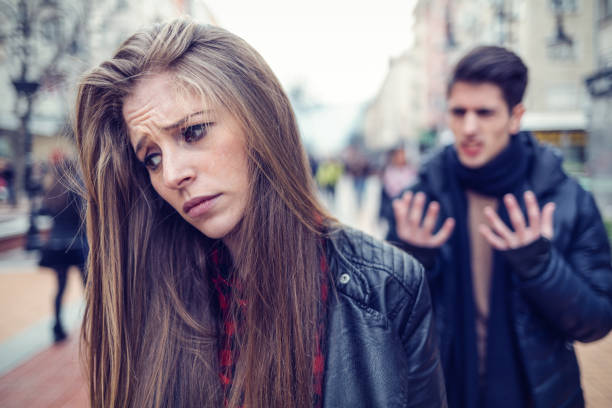 istock Young couple on the street having some problems 846775716