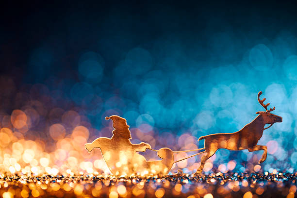 christmas santa sleigh and reindeer - backgrounds defocused - reindeer christmas decoration gold photography imagens e fotografias de stock