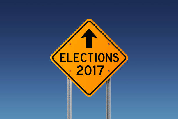 istock Yellow 2017 Elections Ahead Traffic Sign on Blue Sky 846778106
