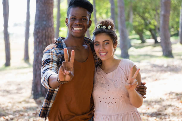 istock Couple posing together in the park 846779190
