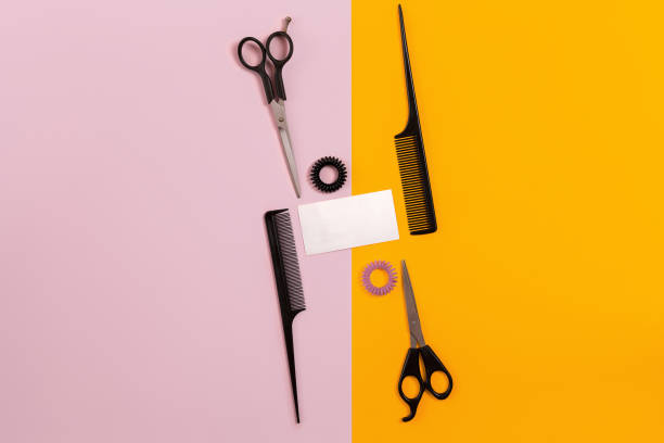istock Hairdresser tools on pink and orange background with copy space 846786286