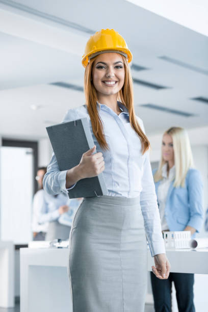 istock Young architect standing and smiling in the office 846789506
