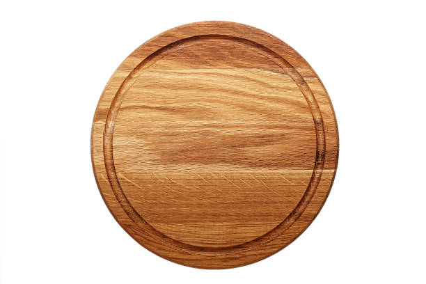 circular wooden cutting board stock photo