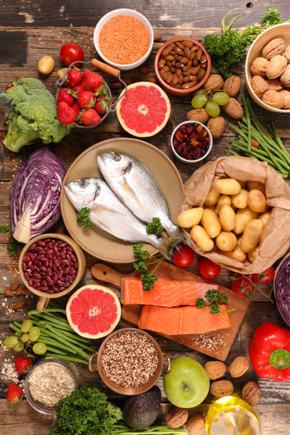 istock various of food with fish, fruit,vegetable and cereal 846796006