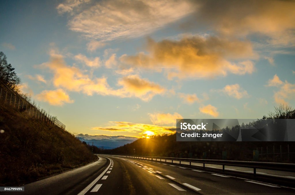 Road trip from Asahikawa to Sapporo, Hokkaido. Beautiful sunset view along the road from Asahikawa to Sapporo, Hokkaido's largest city. Driving in Hokkaido is amazing, the road-trip was full with amazing view of natural scene. Arrival Stock Photo