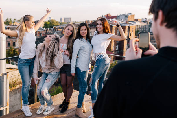 istock Photo on mobile phone. Female company having fun 846800396
