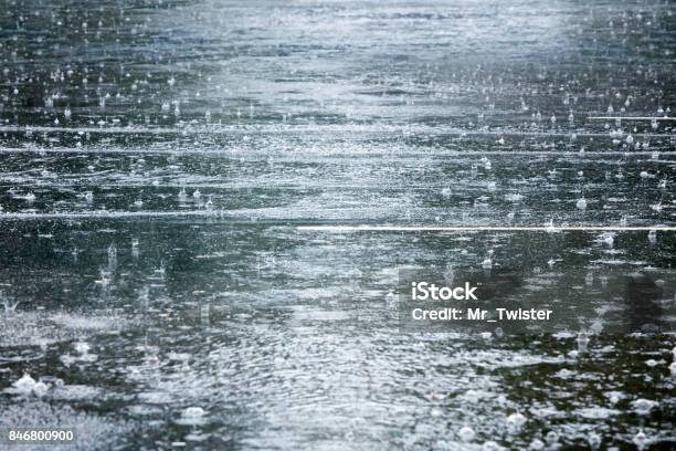 Flooded Road During Heavy Rain With Raindrops Splashes Stock Photo - Download Image Now