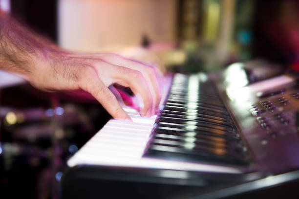 istock Musician plays keyboards in a rock band 846806552