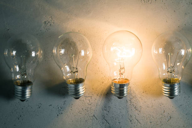 istock Group of vintage bulbs on concrete background 846811358
