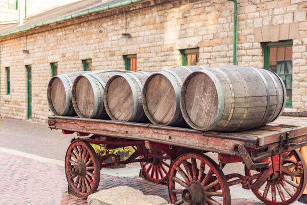 istock barrels lined up on a carriage old stone building 846818506