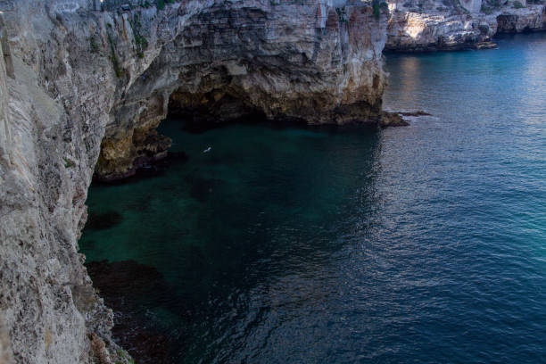 istock Cave in Polignano a Mare, small town built on rocks in Bari, Italy 846826372