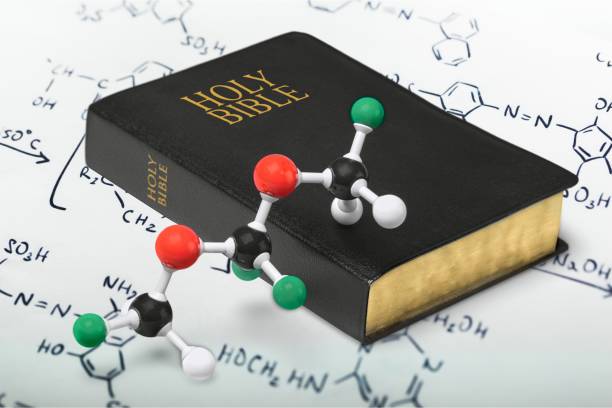 Science. Holy bible and chemistry form, close-up view religious text stock pictures, royalty-free photos & images